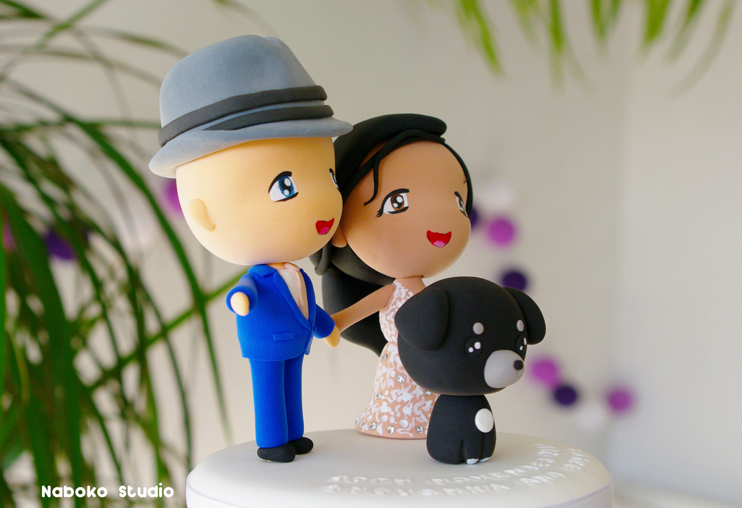 Custom Wedding Cake Topper with Dog | Groom in Borsalino Hat and Bride with Black Dog