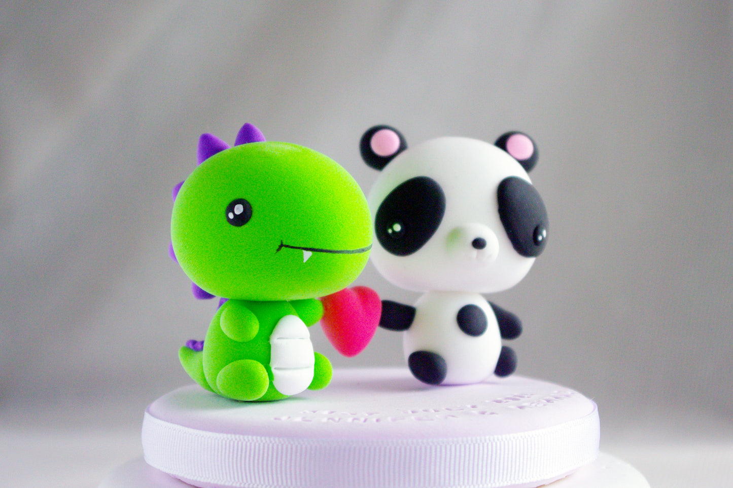 Dinosaur and Panda Wedding Cake Topper