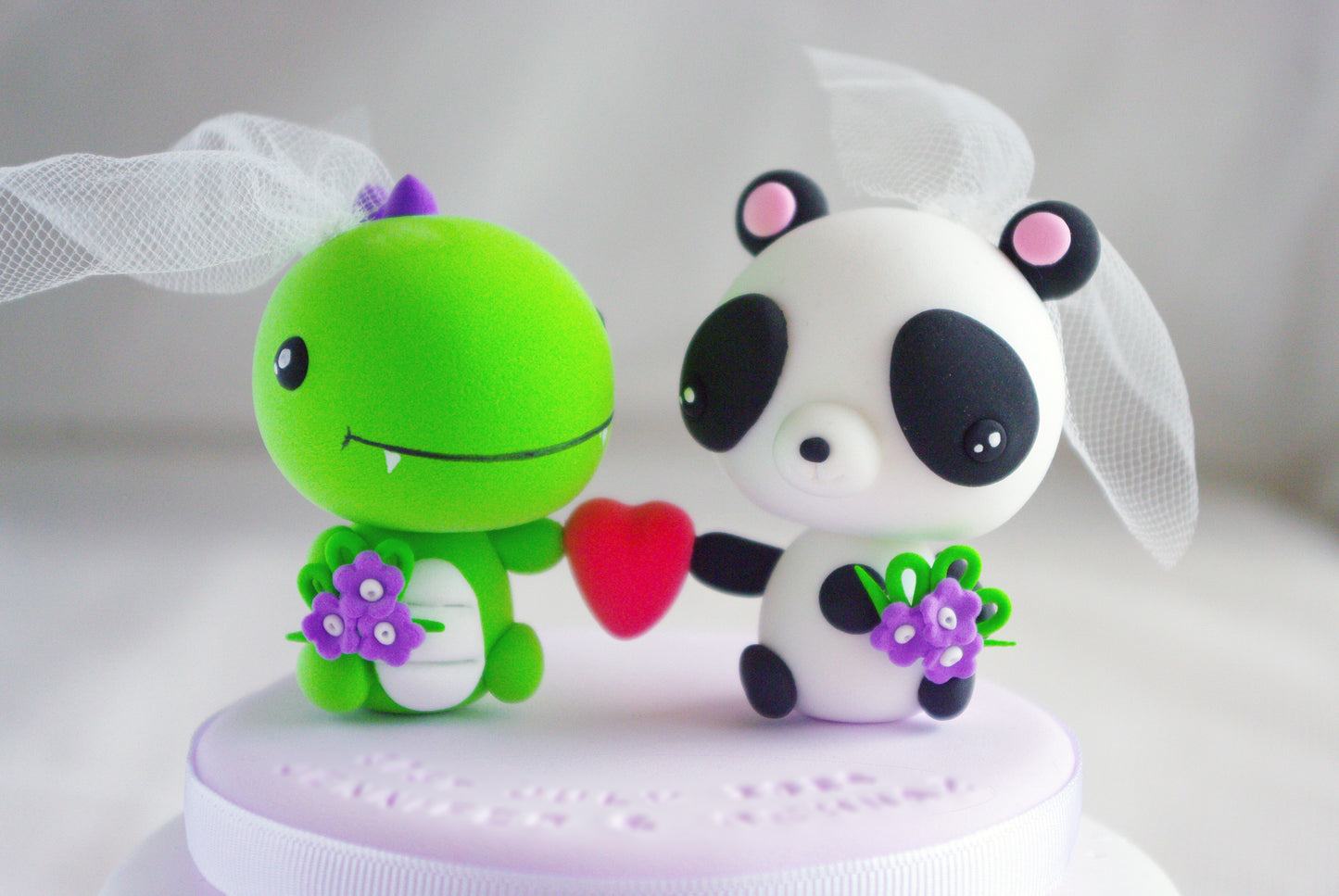 Dinosaur and Panda Wedding Cake Topper